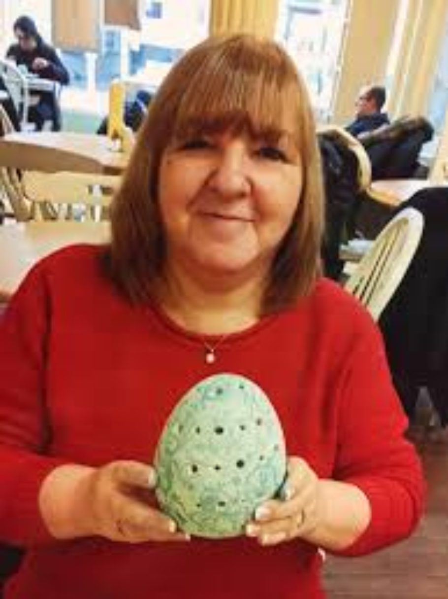 Bernadette holding an egg
