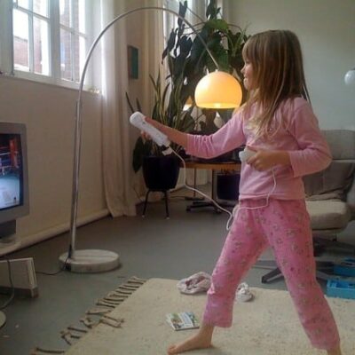 Girl playing Wii Sports