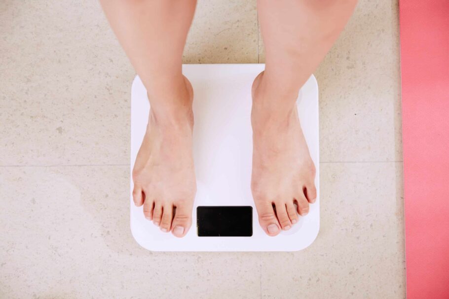 Person standing on an electronic weighing scale