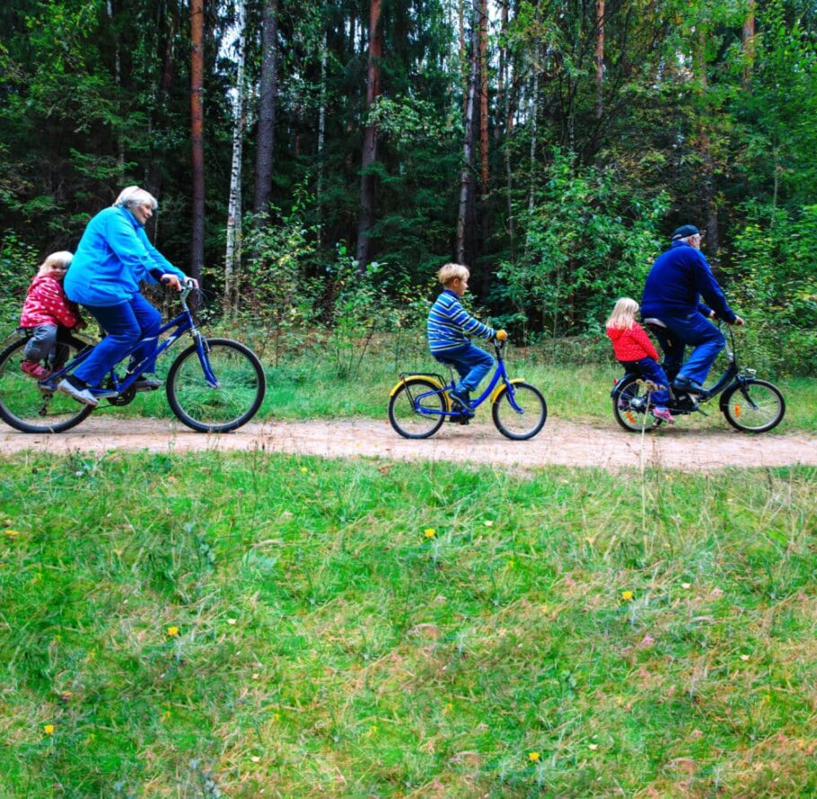 Family out on a bike ride in the forest