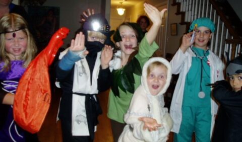 Group of children dressed in halloween costumes