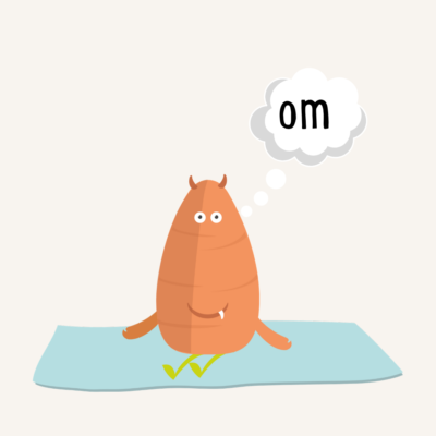 A beezee bodies mascot (a carrot) meditating