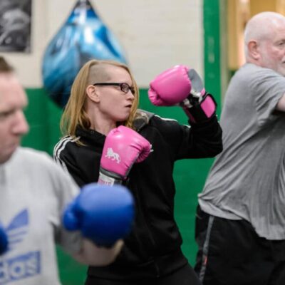 Adults doing boxing exercise