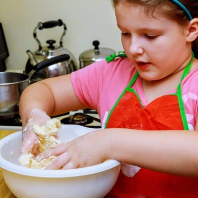 Overweight child baking
