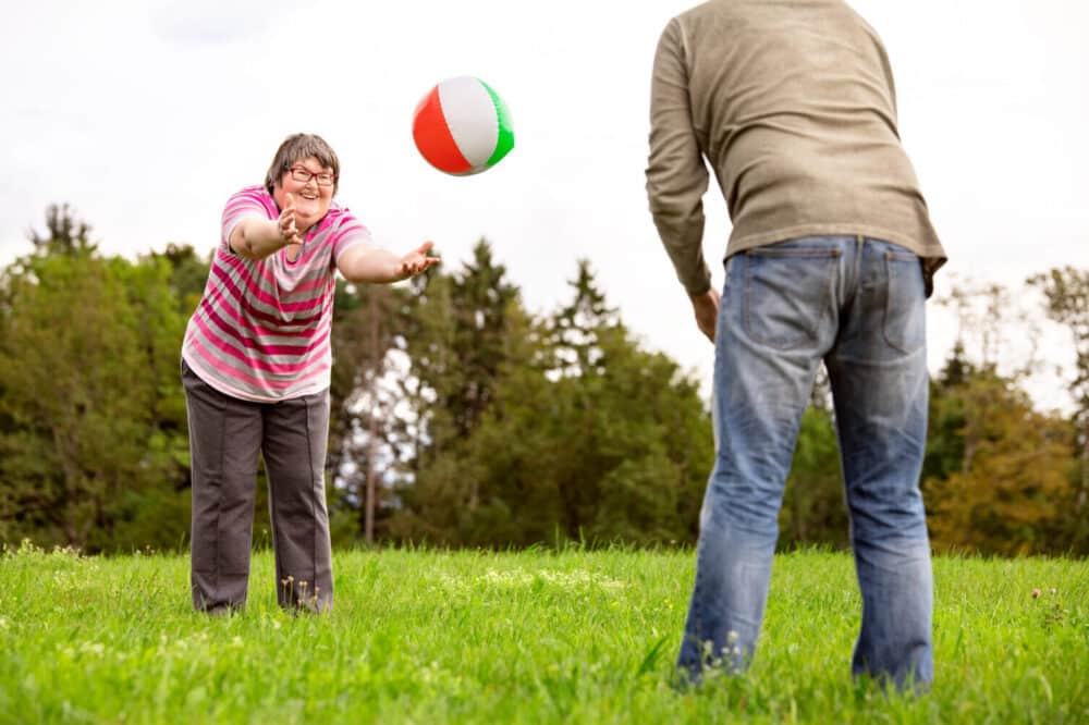 woman with mental disability playing a ball game