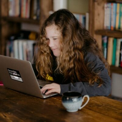 Teenage girl learning online