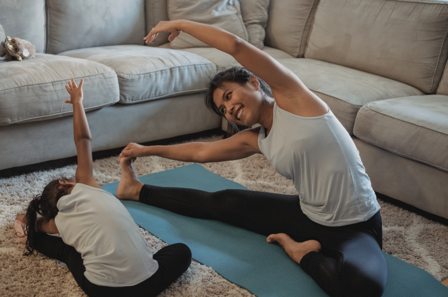Woman and Child doing Yoga together